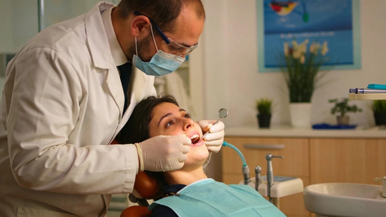 ER Dental dentist examining patient's teeth in Tauranga clinic.