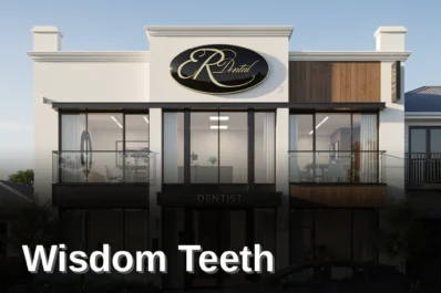 Dentist reassuring patient before wisdom teeth removal